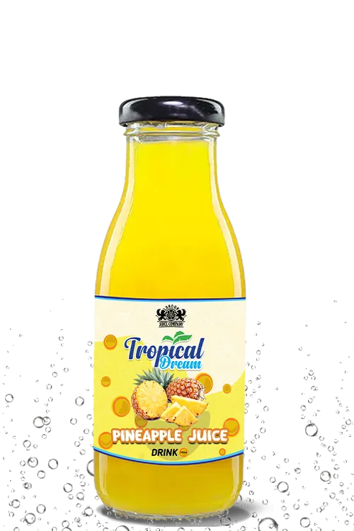 Tropical Dream Pineapple Juice Drink by London Juice Company in a clear glass bottle with a black cap.